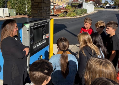 student learning about ATM machines