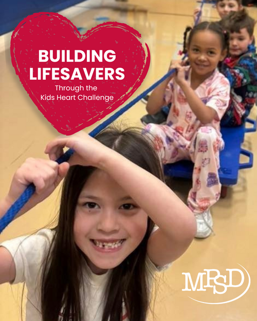 student on floor scooter holding a rope and smiling in the gym. Heart graphic with 