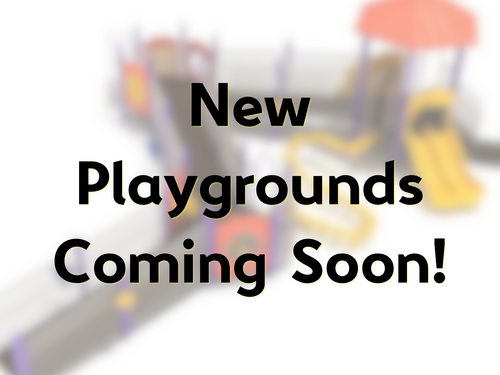 New playgrounds coming soon. playground equipment blurred in the background