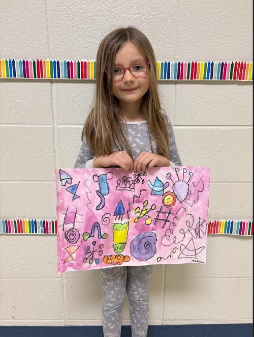 Madison shows her winning billboard design