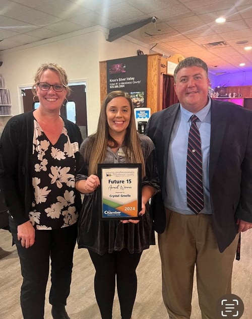Crystal Groelle with the principal and superintendent