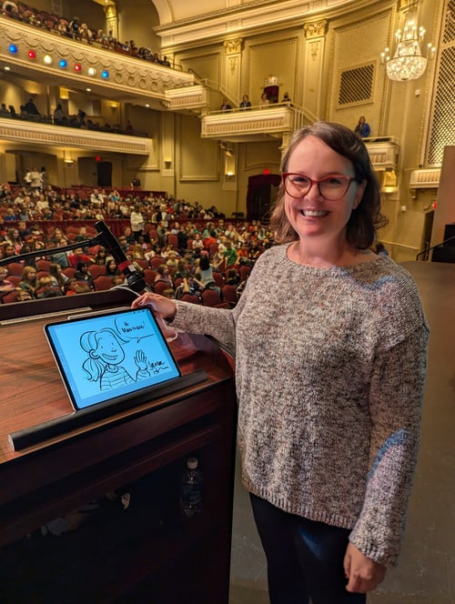 Raina Telgemeier, the award-winning author and illustrator, on stage at Capitol Civic Center