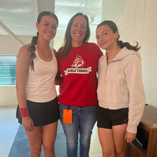Taylor and Zylia posing with Coach Henschel